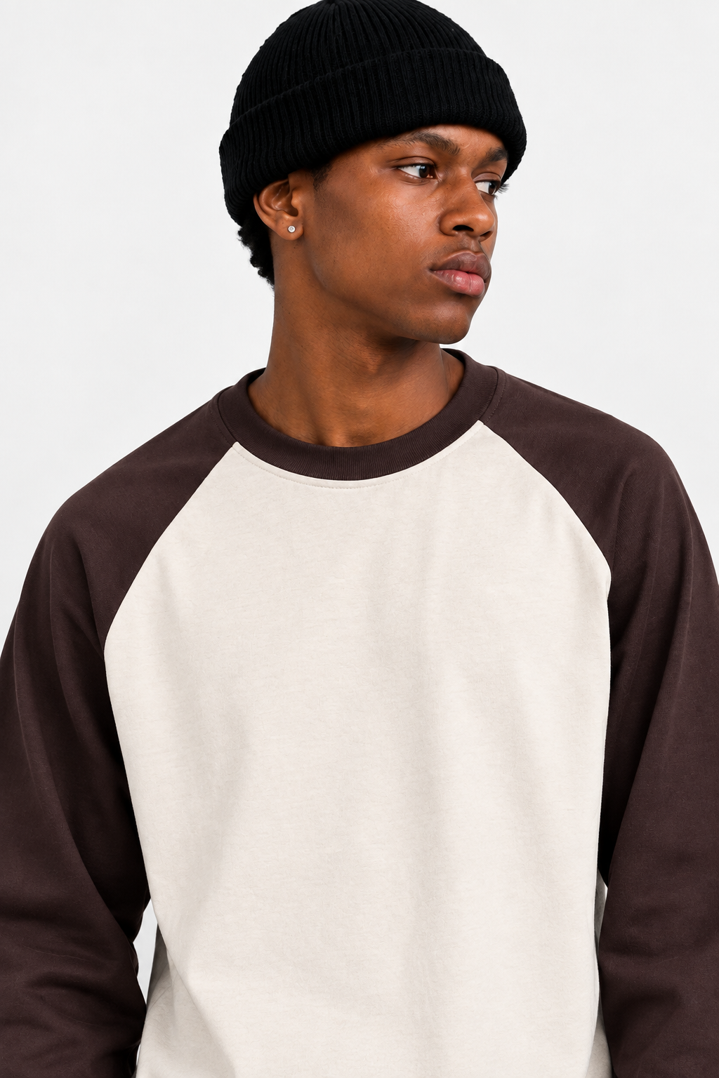 Close-up of model wearing the cream-and-brown raglan tee
Daniel Alaves Raglan Long Sleeve Tee — 300GSM | Cream / Brown

