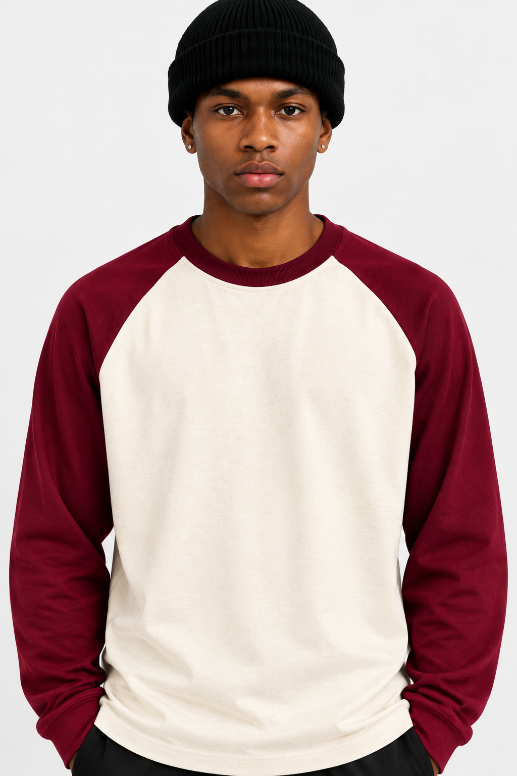 Front-facing close-up of model wearing the cream-and-burgundy oversized 300gsm Daniel Alaves Long sleeve oversized t-shirt  